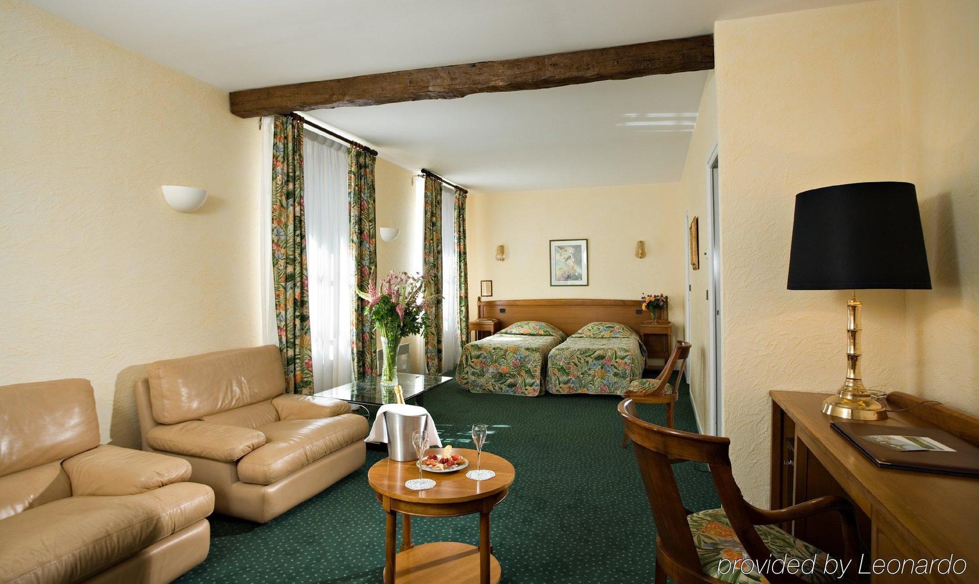 Hotel Les Ursulines Отон Стая снимка